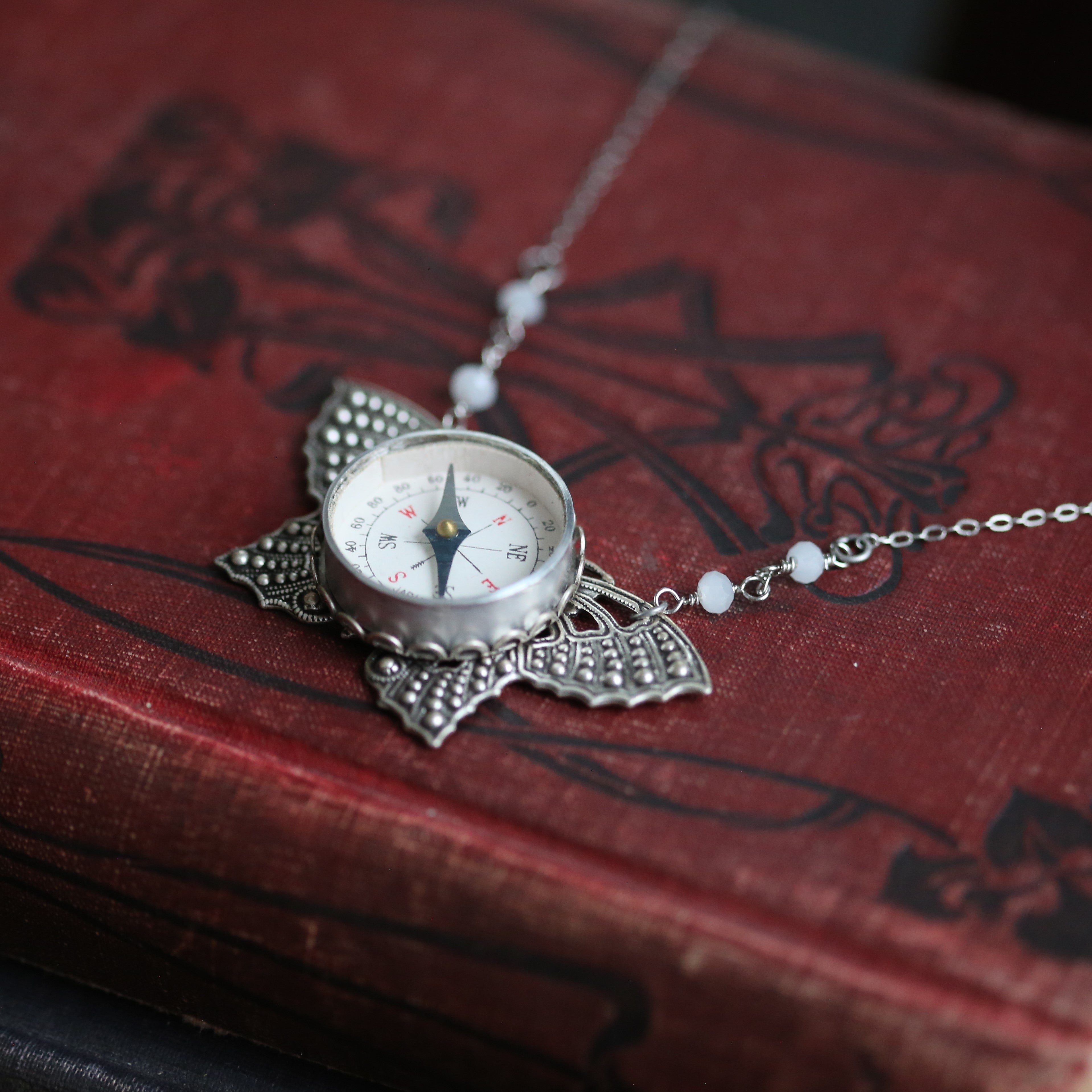 Butterfly Filigree Compass Short Necklace in Antique Silver with Translucent White Beads