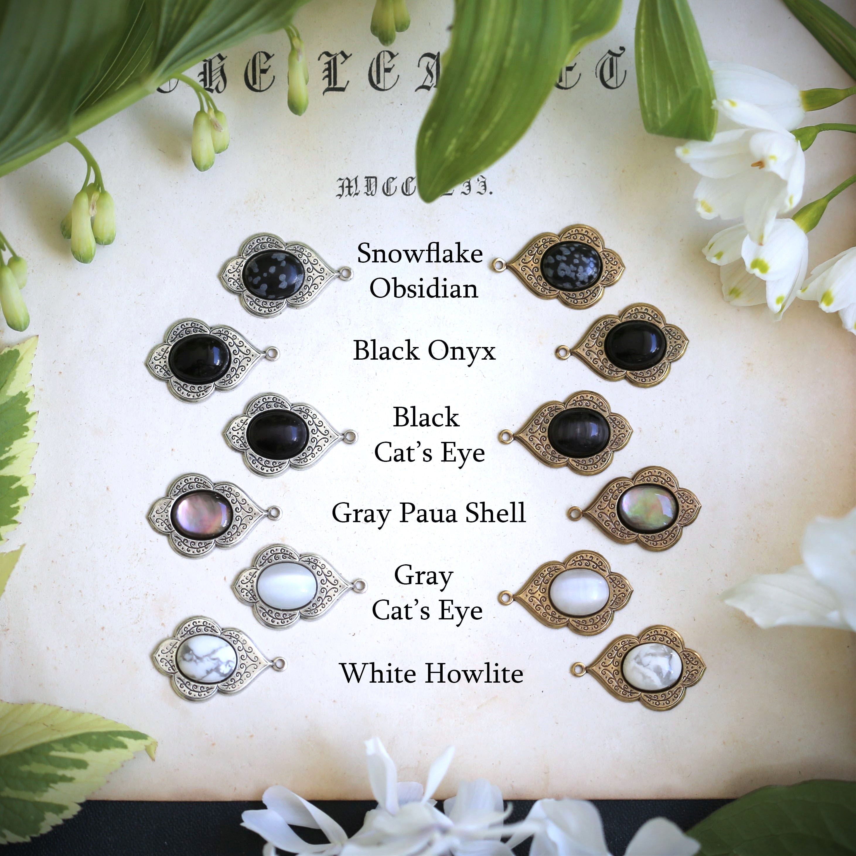 a selection of silver and brass vintage style stone drop dangle earrings in the shades of black gray and white options