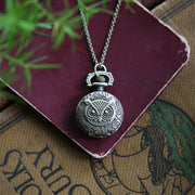 antiuqed brass wearable pocket watch necklace with owl. Battery operated.
