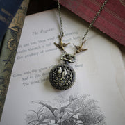 Antiqued brass battery operated pocket watch necklace with birds.