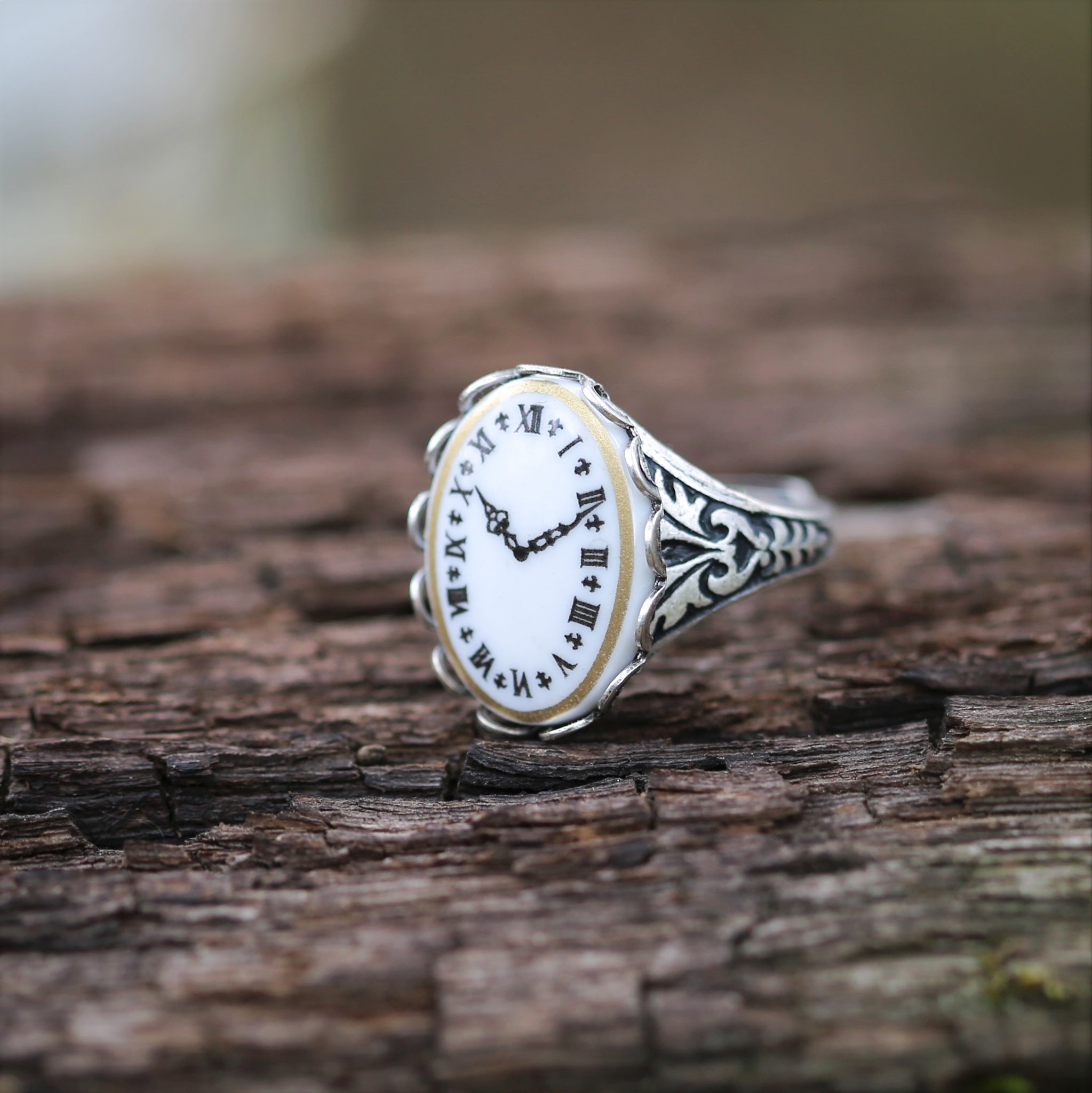 Antiqued Silver adjustable ring in the vintage style with a time piece cameo set on the front.  Gothic style. Geeky chic. Cosplay Jewelry.