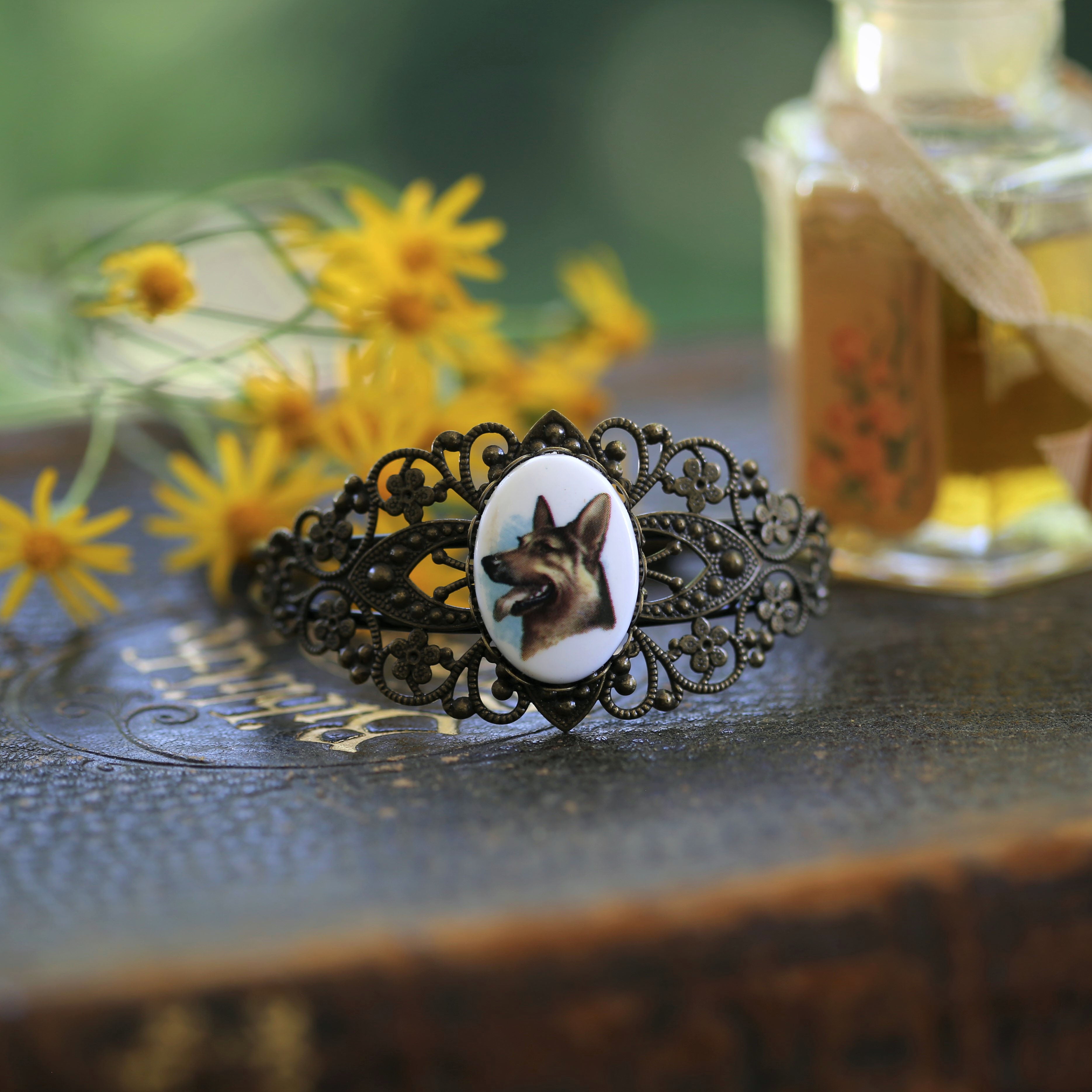 Vintage antiqued brass german shepherd dog cameo cuff bracelet. Made by ragtradervintage