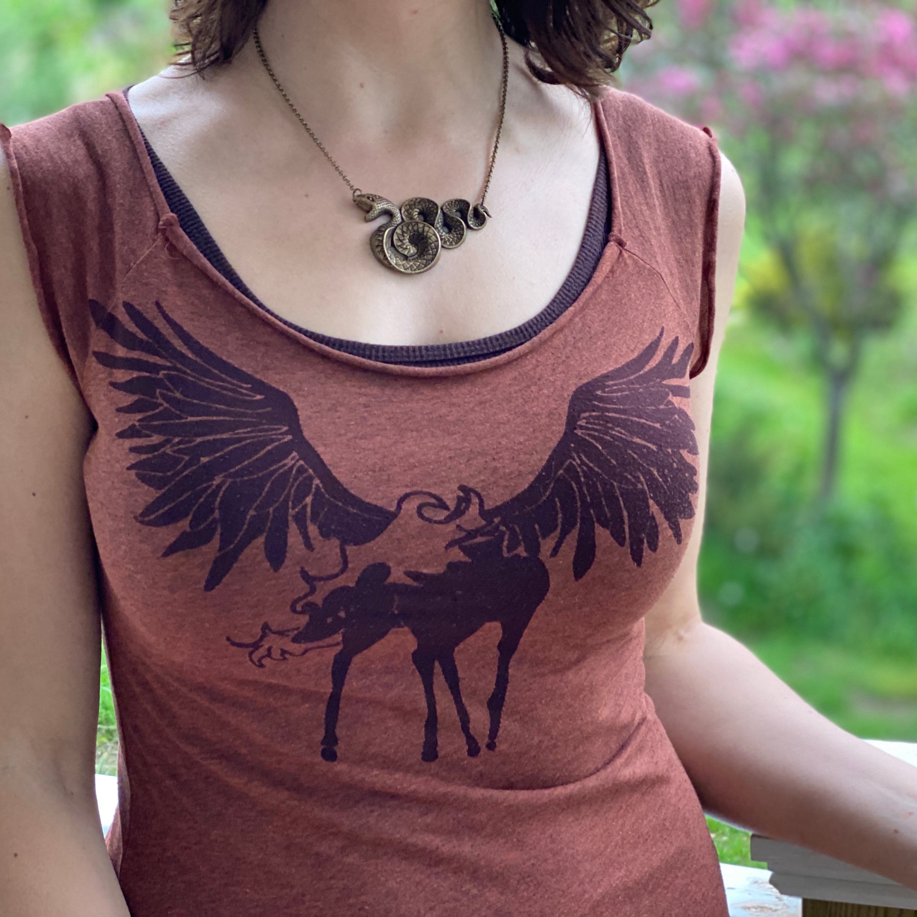 Antiqued brass Victorian snake pendant necklace.