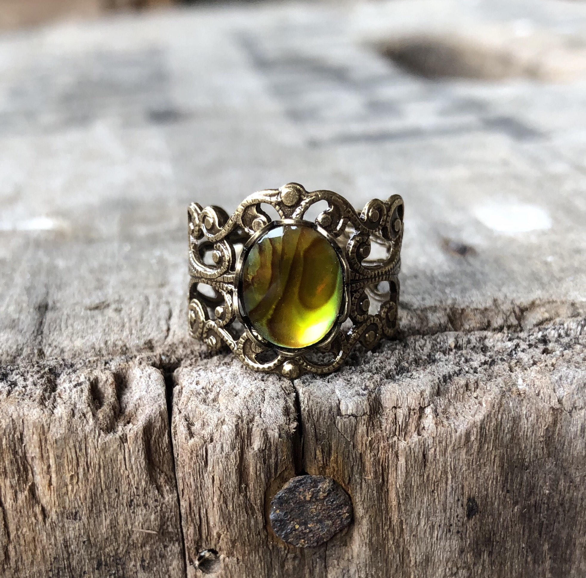 antiqued brass modern vintage inspired fully adjustable yellow green oval shell ring in shabby chic aesthetic
