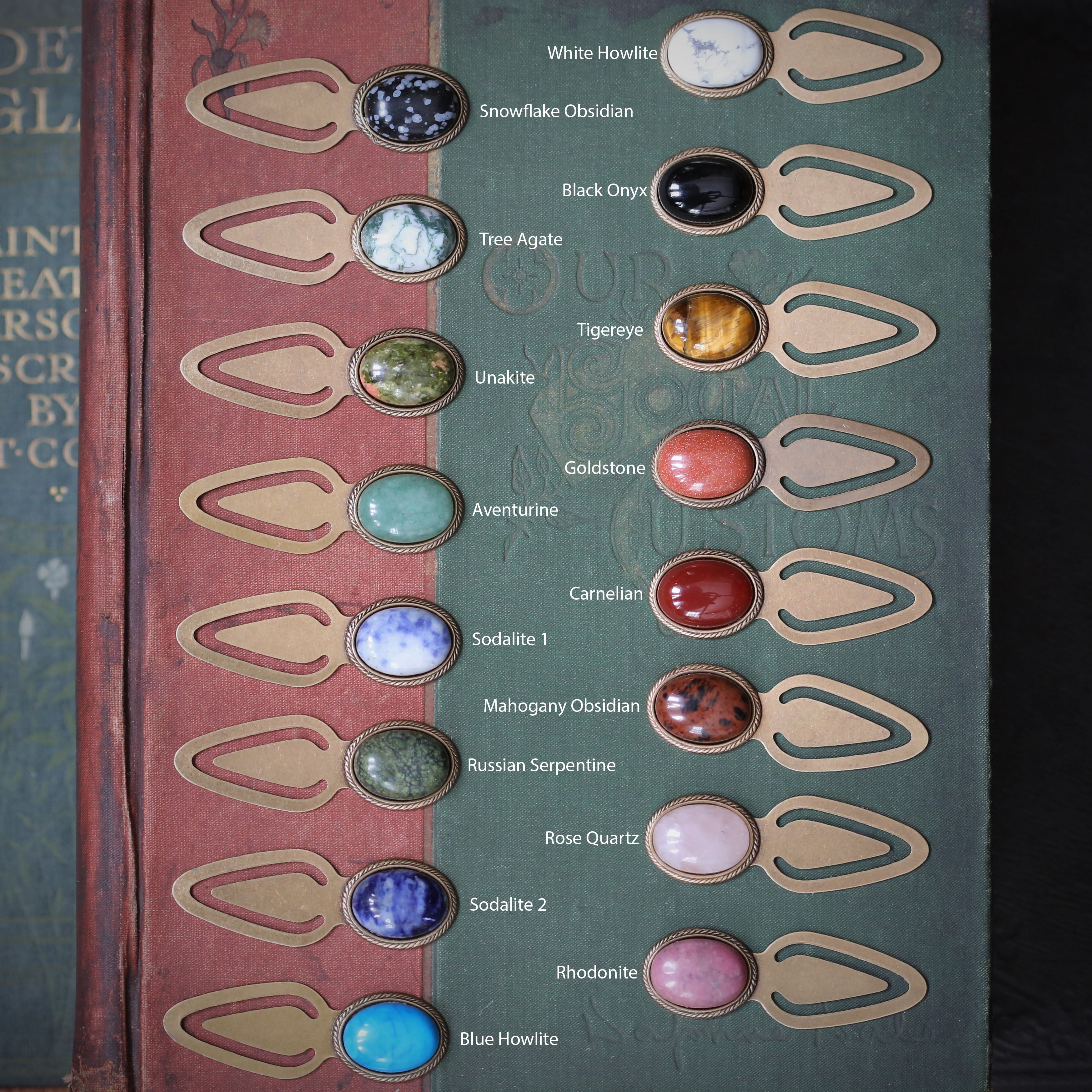 Antiqued brass metal clip bookmarks with oval semi-precious oval stone cabochons available at ragtrader vintage gift for mineral lover of crystal meanings