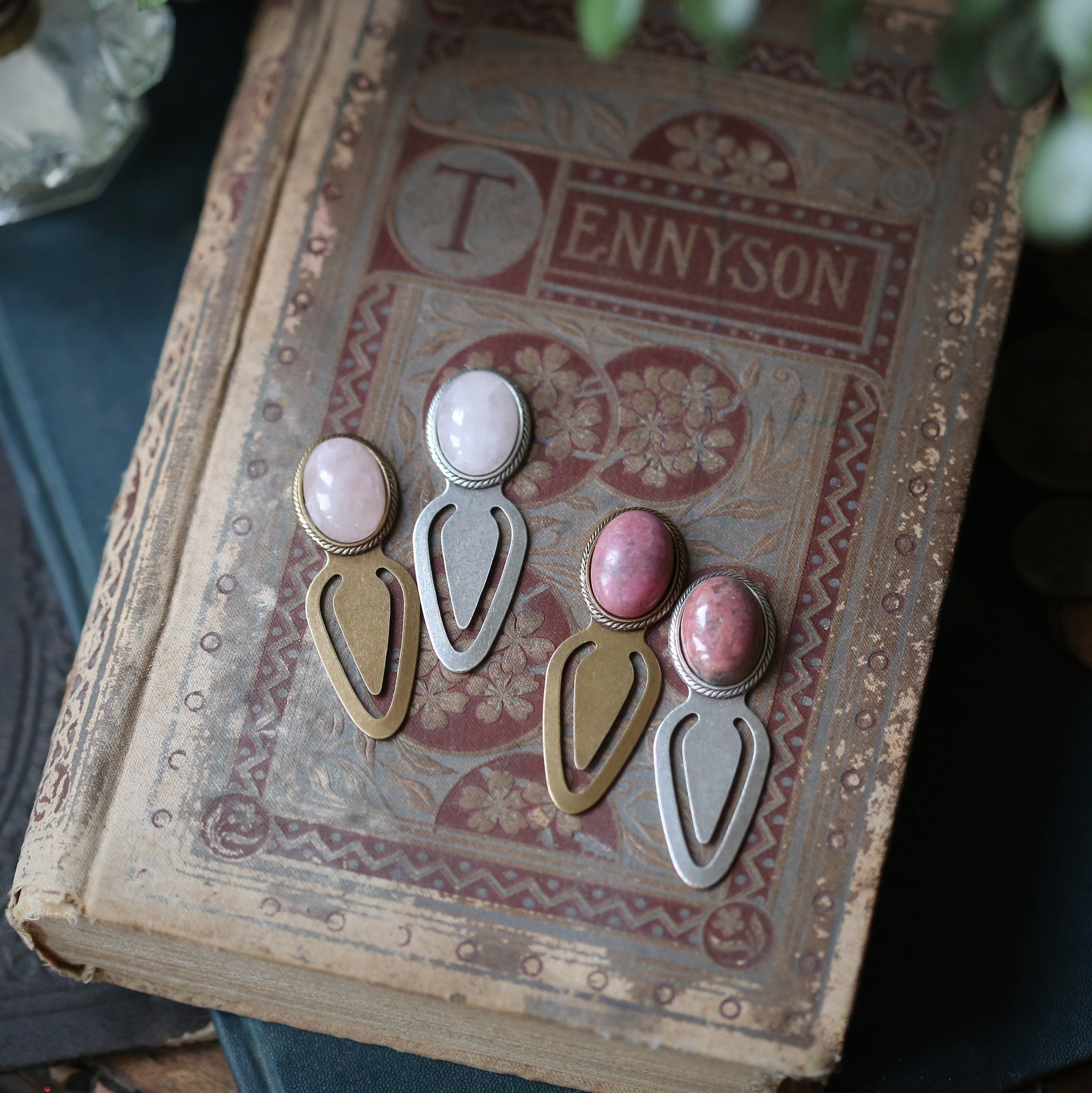 Antiqued brass and silver metal clip bookmarks with oval semi-precious oval stone cabochons in pink rose quartz and rhodonite in bubble goth aesthetic gift for book lovers