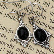 Antiqued silver vintage style art deco dangle stone earrings with black onyx oval mineral.