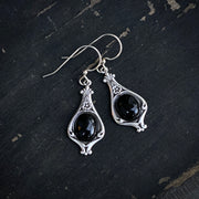 Antiqued silver vintage style stone drop black onyx oval mineral hook earrings.
