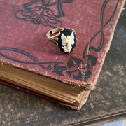 Antiqued brass retro vintage style adjustable ring with black and white angel cameo ring.