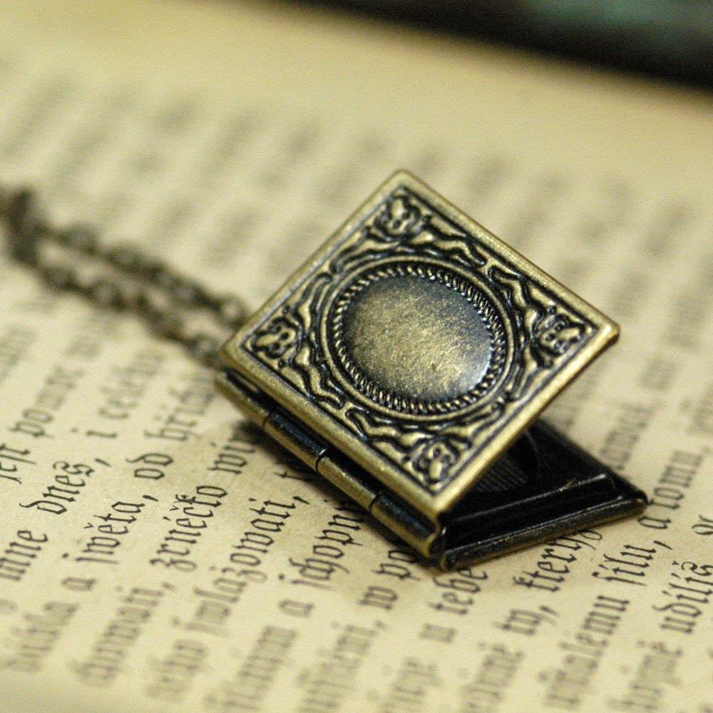 Antiqued brass book locket