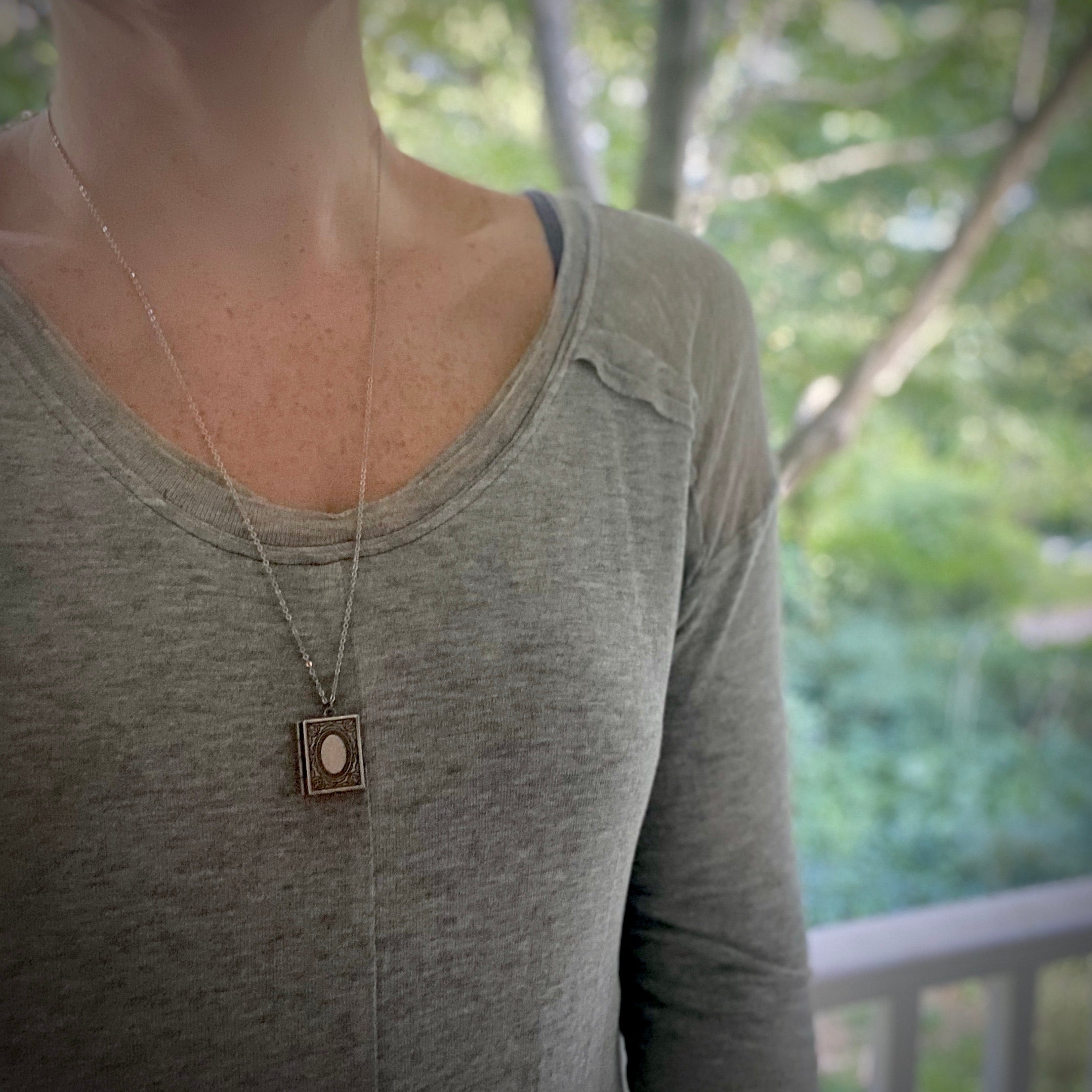 Antiqued silver book locket