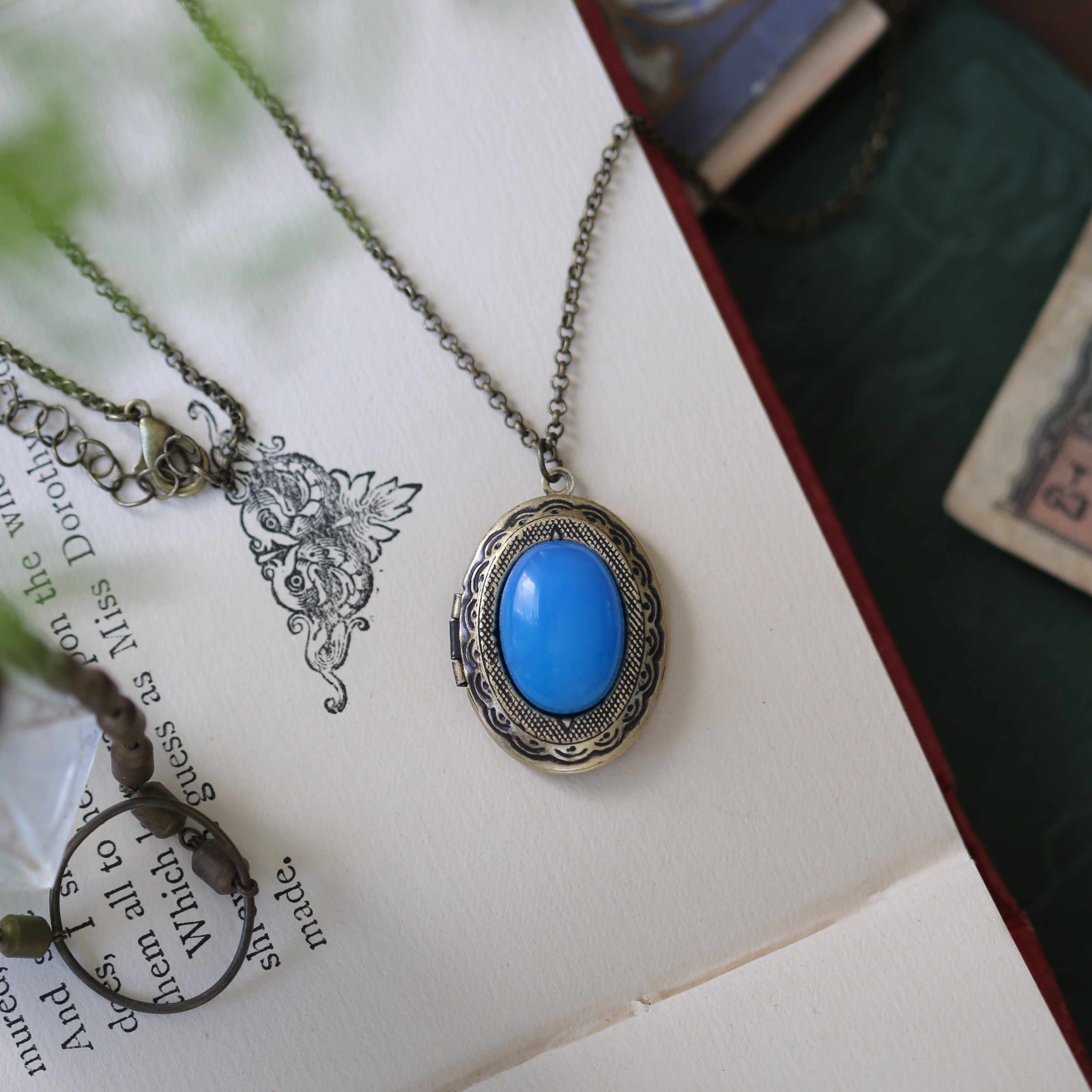 antiqued brass vintage style blue agate semi-precious mineral oval stone lockets in Zen fashion style
