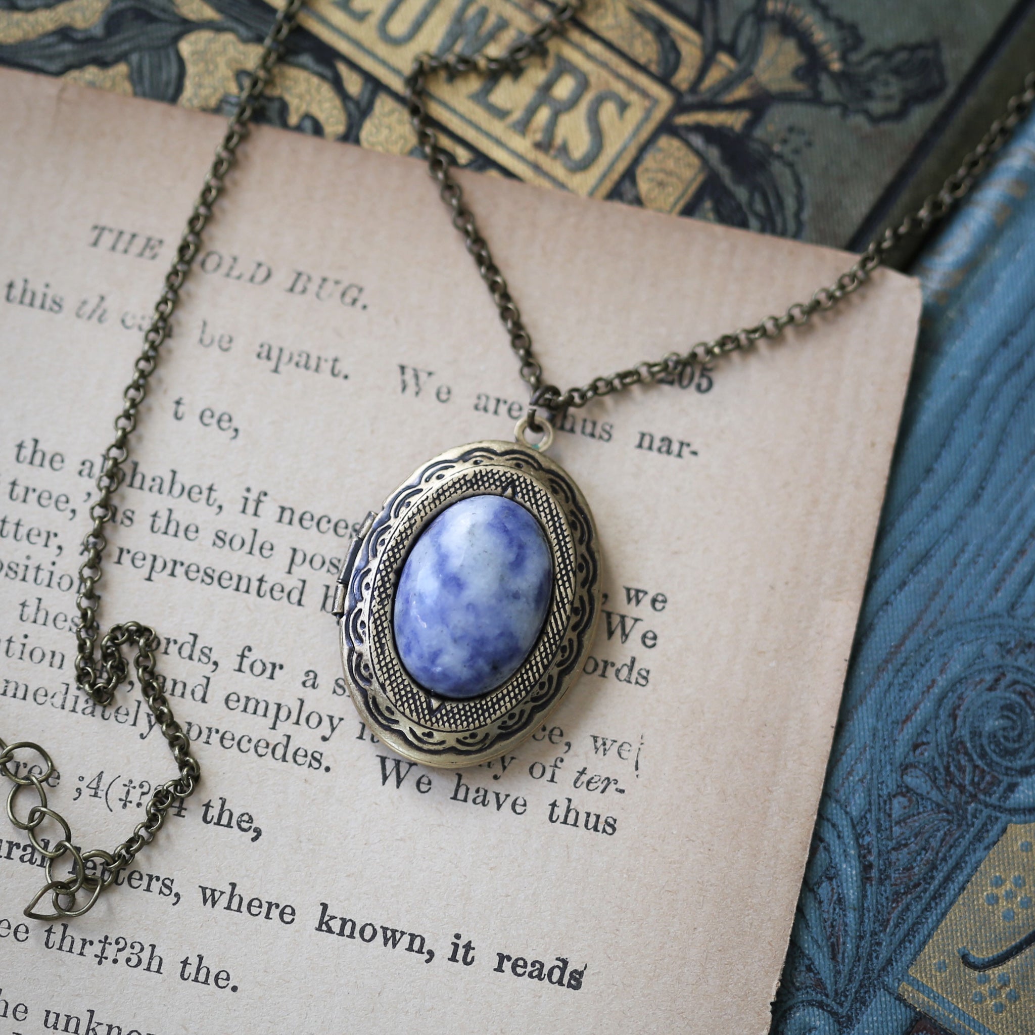 antiqued brass vintage style blue sodalite semi-precious mineral oval stone lockets in classic lolita style