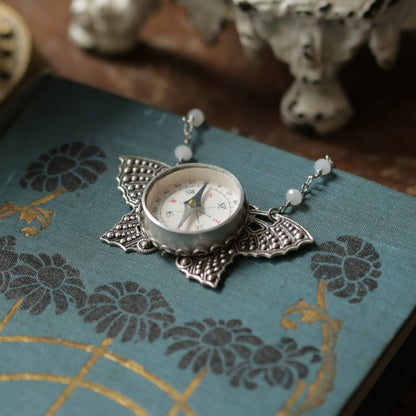 Butterfly Filigree Compass Short Necklace in Antique Silver with Translucent White Beads