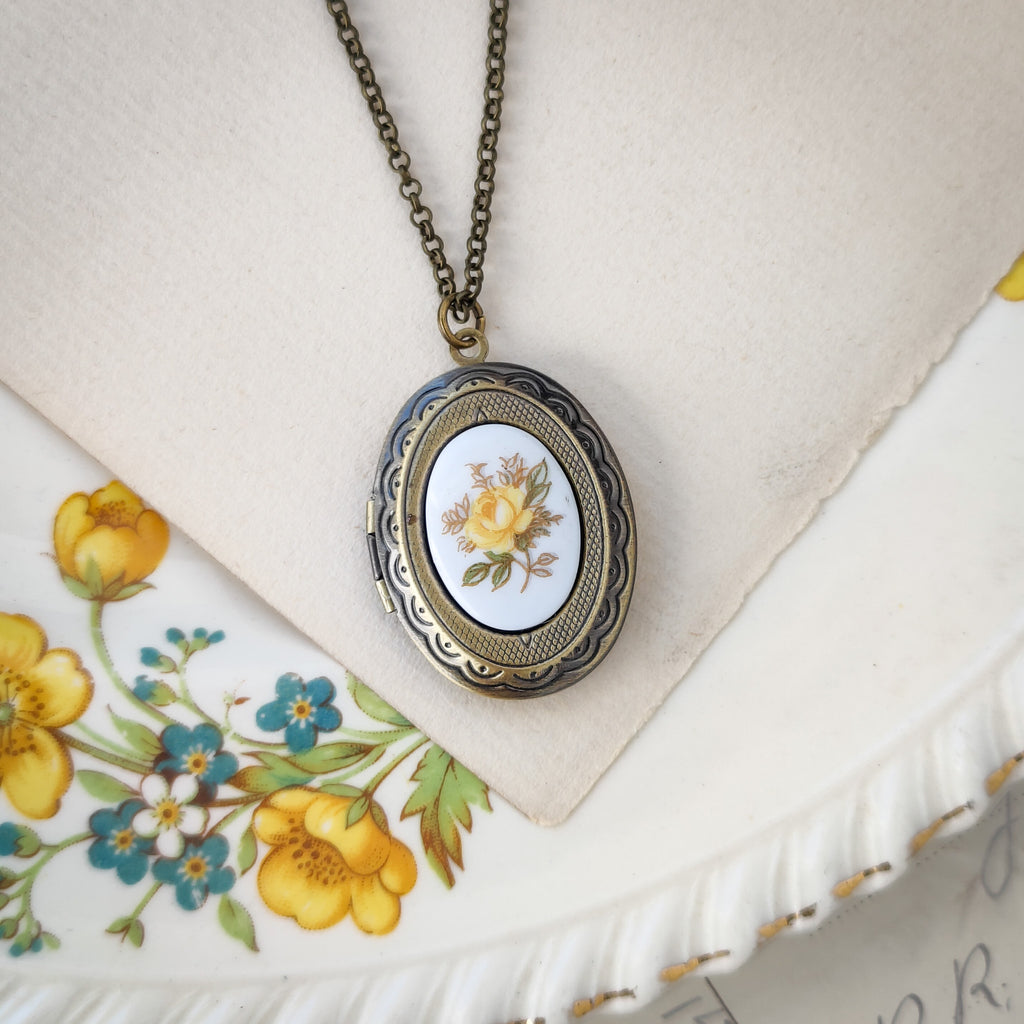 Antiqued brass vintage style locket necklace with antique porcelain yellow rose cameo