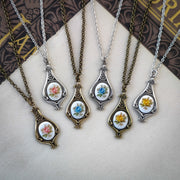 Antiqued retro-style drop necklace with vintage porcelain rose cameo