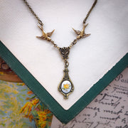 Antiqued bird Victorian style necklace with vintage rose teardrop ceramic cameo pendant.
