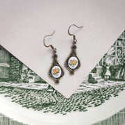 Antiqued brass retro style tear drop earrings with vintage yellow rose porcelain cameos