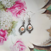 Antiqued silver retro style tear drop earrings with vintage pink rose porcelain cameos