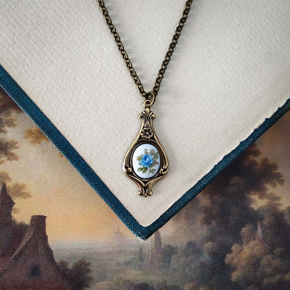 Antiqued retro-style drop necklace with vintage porcelain rose cameo