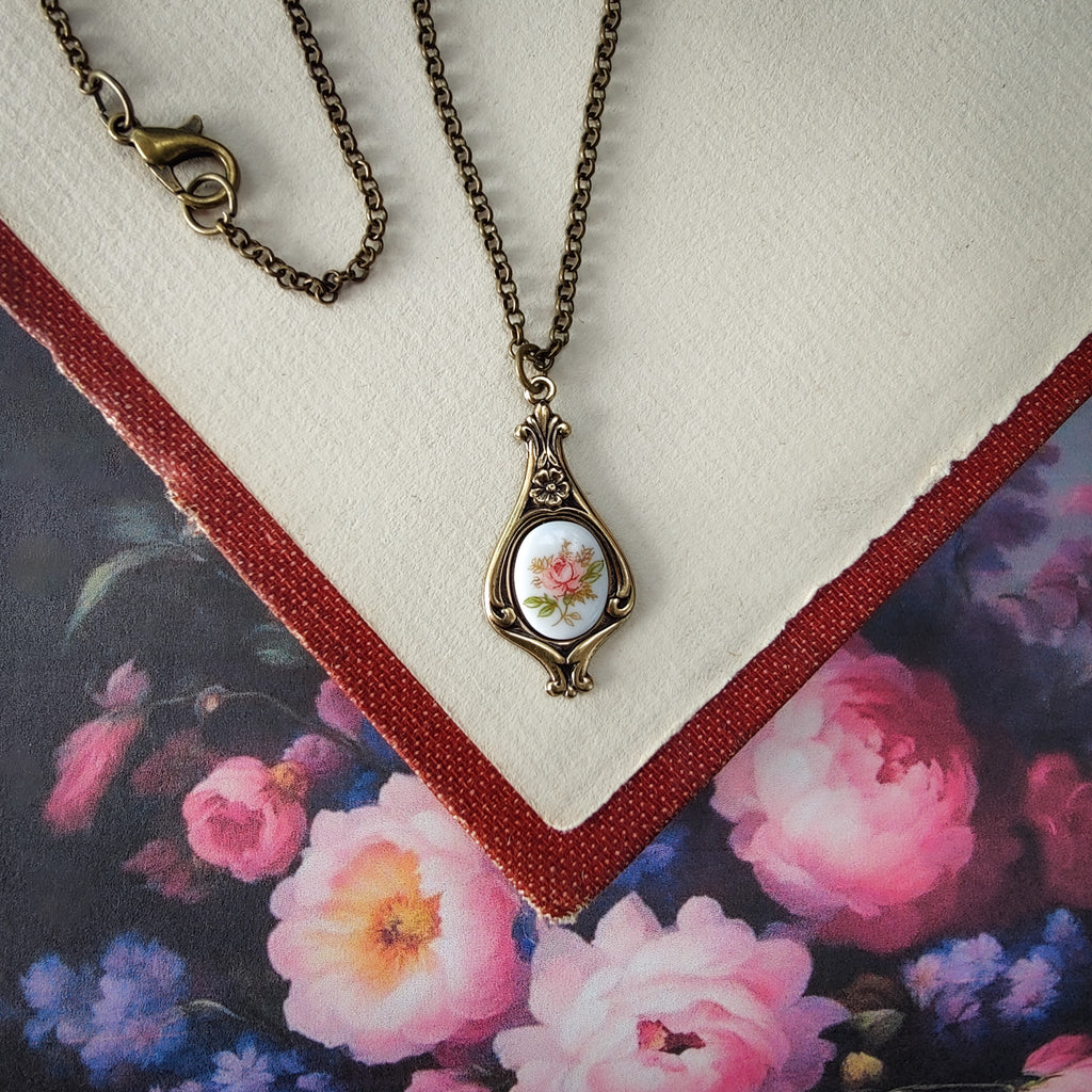 Antiqued retro-style drop necklace with vintage porcelain rose cameo