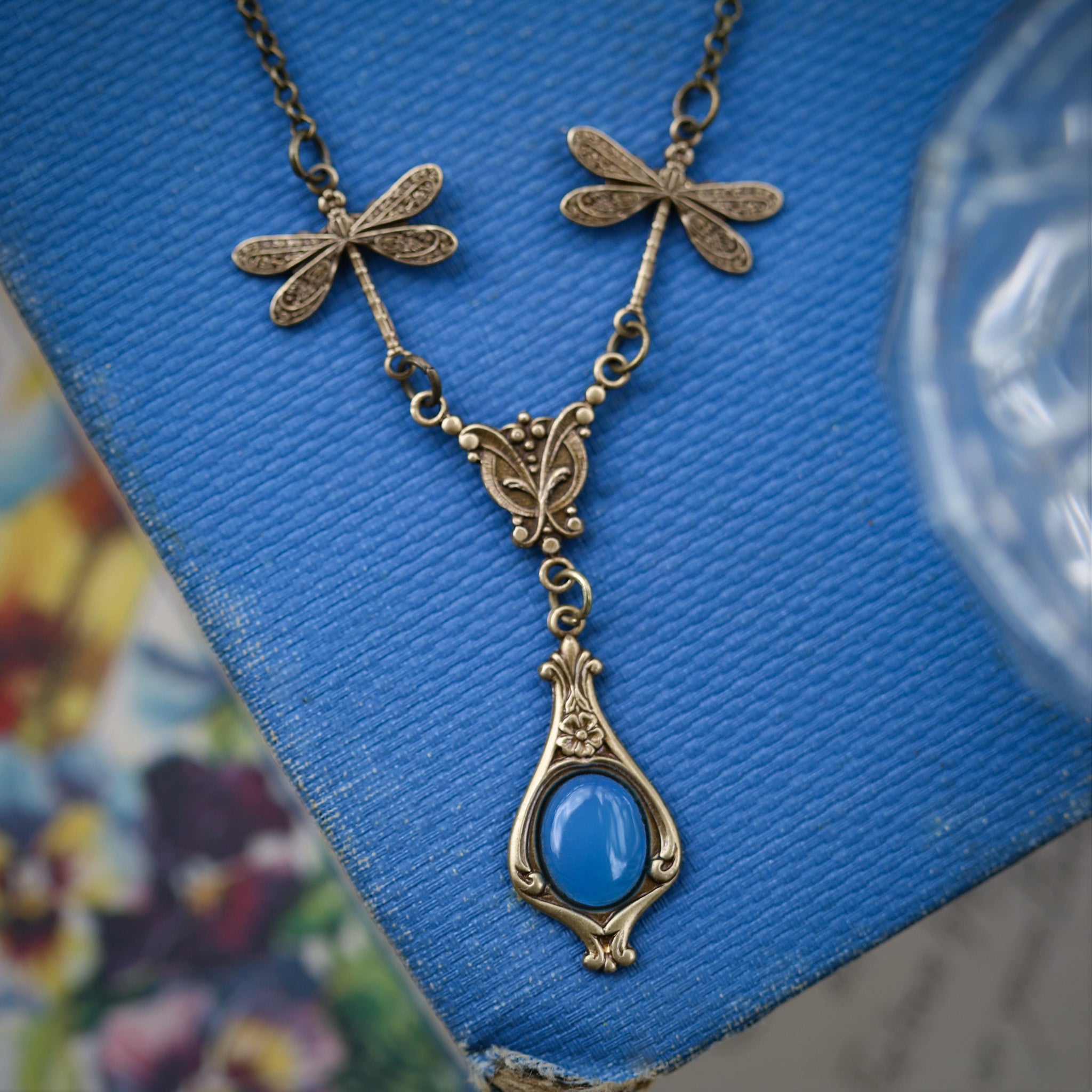 antiqued brass vintage-style dragonfly simple drop semi-precious stone mineral blue agate pendant in renaissance aesthetic