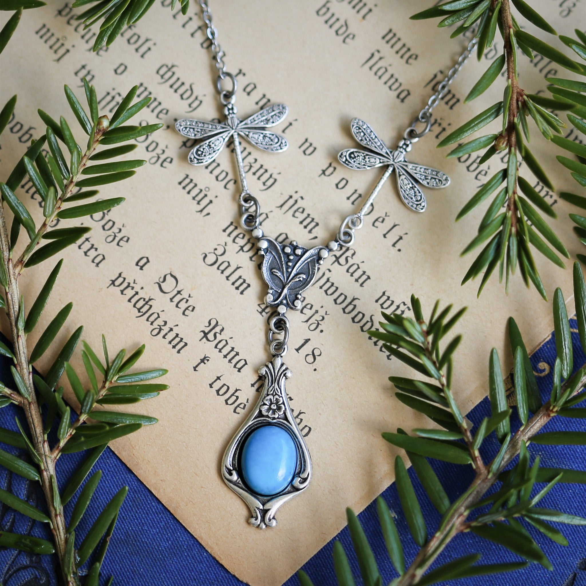 antiqued silver vintage-style dragonfly simple drop semi-precious stone mineral light blue howlite pendant in bohemian aesthetic