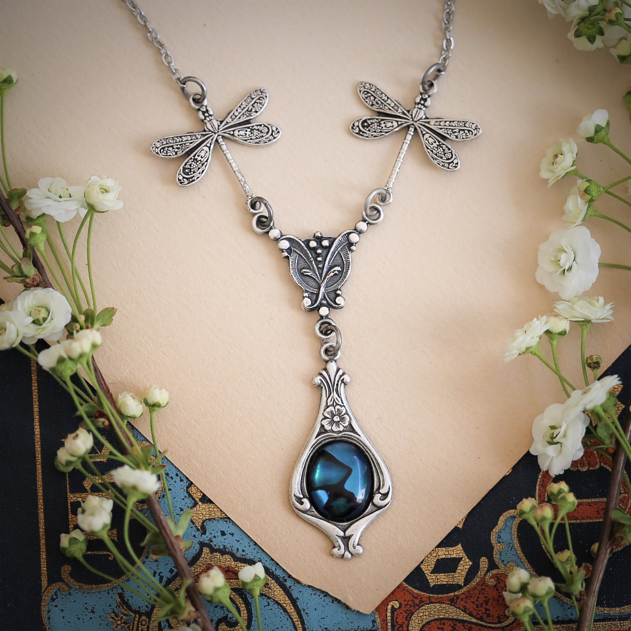 antiqued silver vintage-style dragonfly simple drop blue shell pendant in fairycore aesthetic