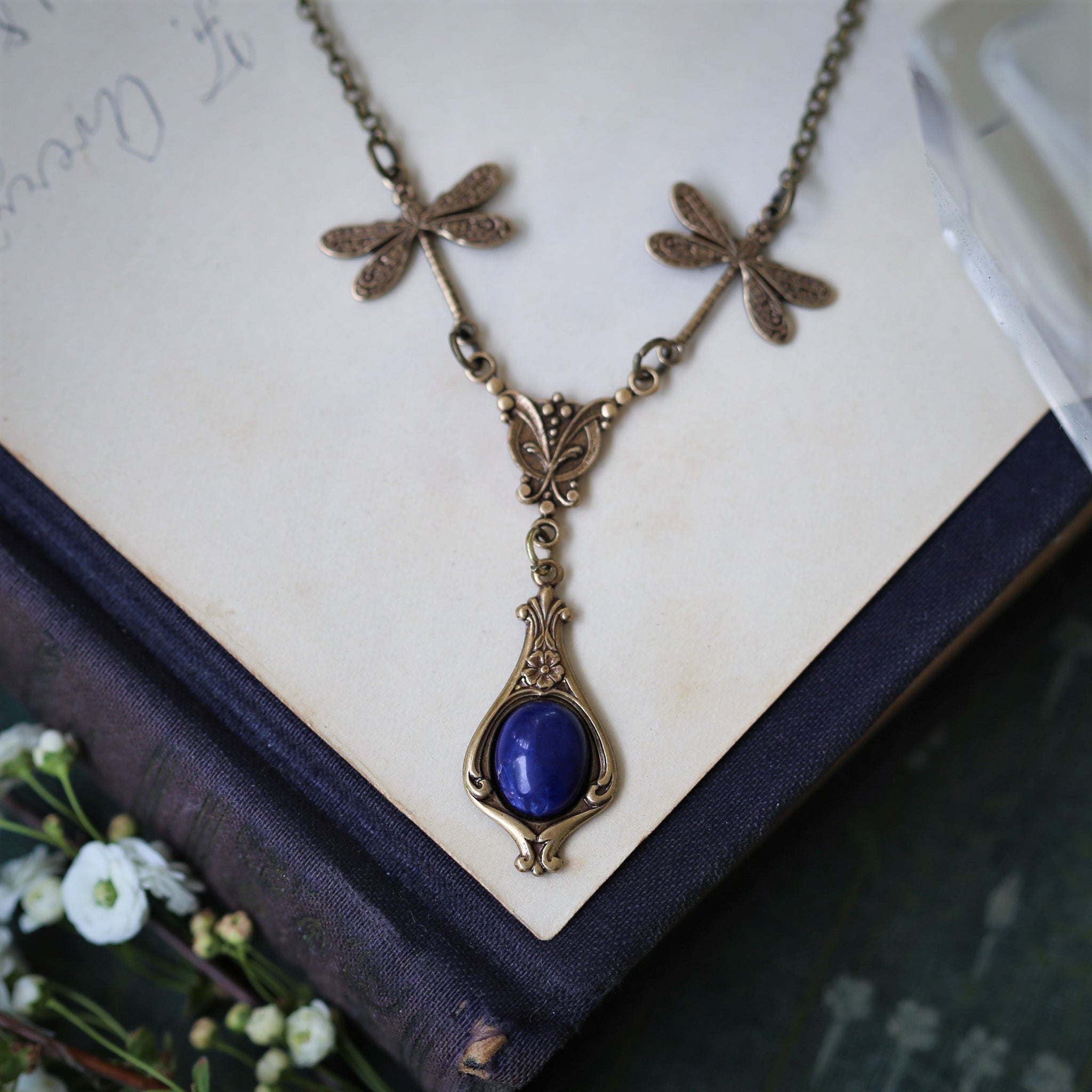 antiqued brass vintage-style dragonfly simple drop semi-precious stone mineral dark blue howlite pendant in historical aesthetic