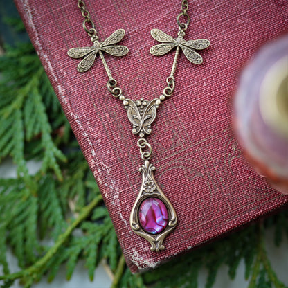 antiqued brass vintage-style dragonfly simple drop pink shell pendant in gardencore aesthetic