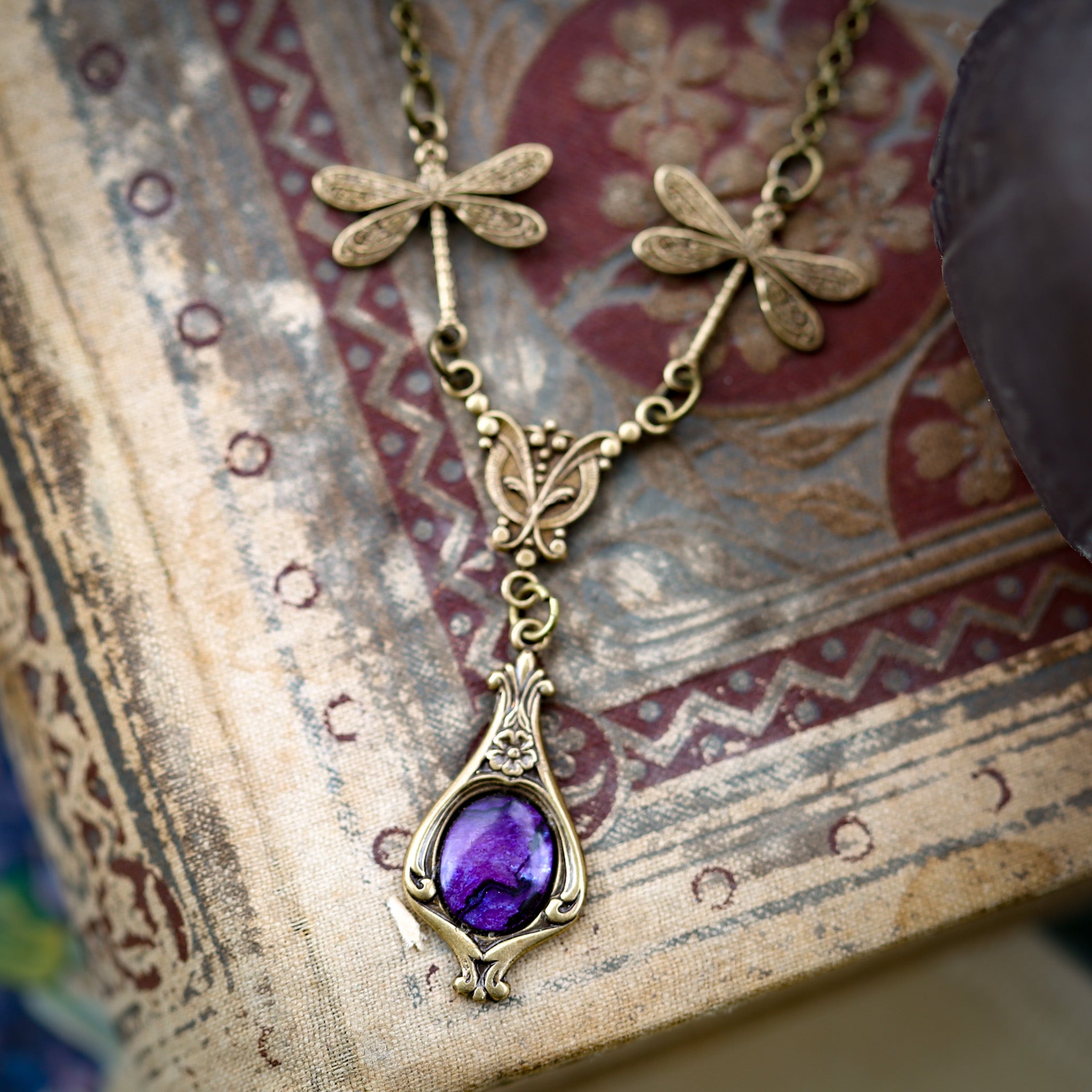 antiqued brass vintage-style dragonfly simple drop purple shell pendant in victorian aesthetic