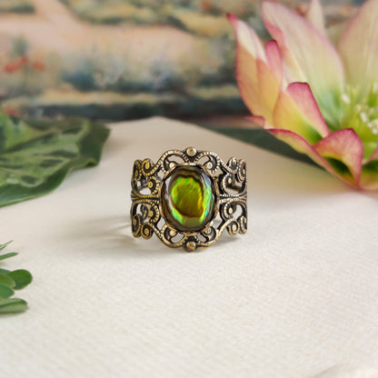 antiqued brass modern vintage inspired fully adjustable yellow green oval shell ring in gypsy girl aesthetic