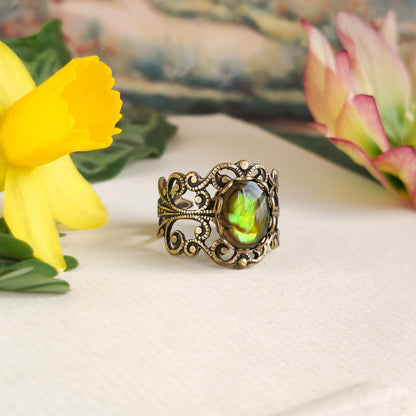 antiqued brass modern vintage inspired fully adjustable yellow green oval shell ring in moss core aesthetic