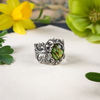 antiqued silver modern vintage inspired fully adjustable yellow green oval shell ring in nautical fantasy aesthetic