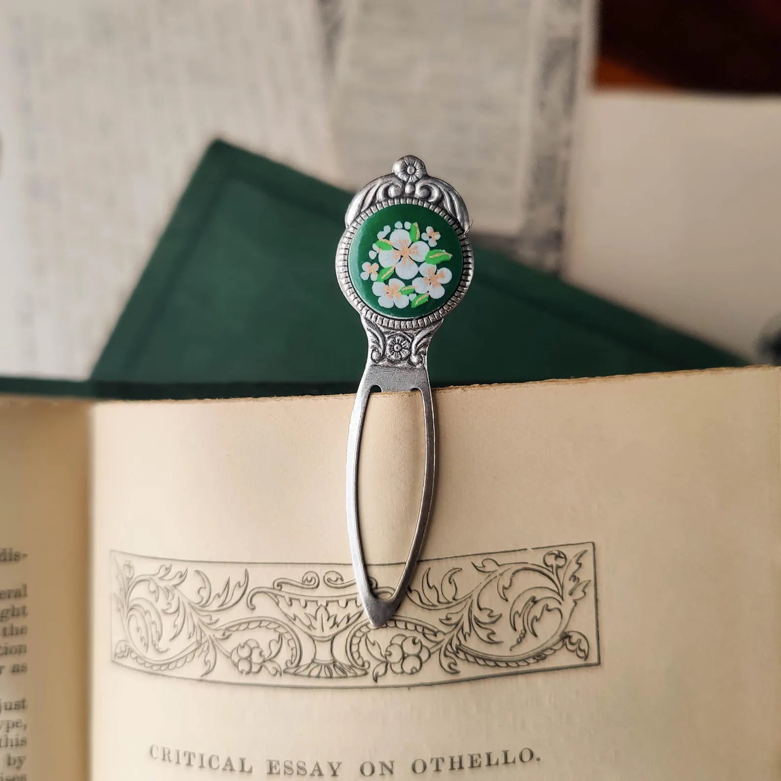 antiqued silver modern vintage inspired book mark clip page saver with a circle metal green flower motif a perfect gift for a teacher.