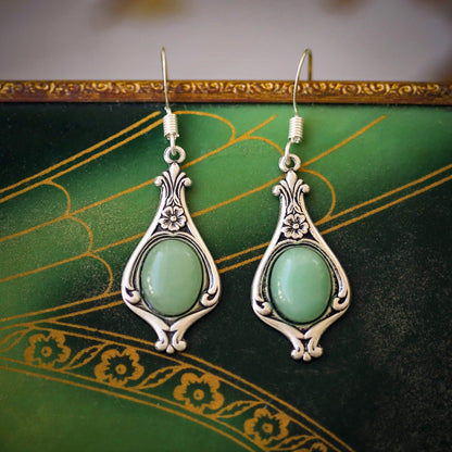 A pair of silver Victorian drop earrings with aventurine gemstones.