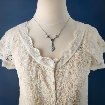 Antiqued bird Victorian style necklace with vintage rose teardrop ceramic cameo pendant.