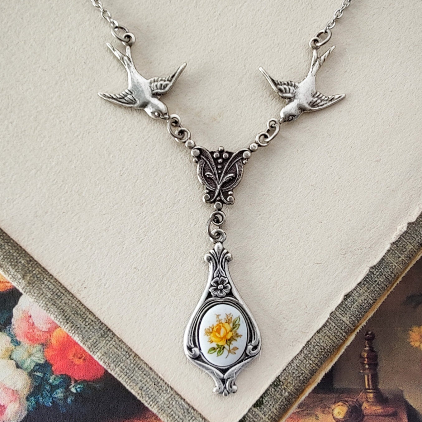 Antiqued bird Victorian style necklace with vintage yellow rose teardrop ceramic cameo pendant.