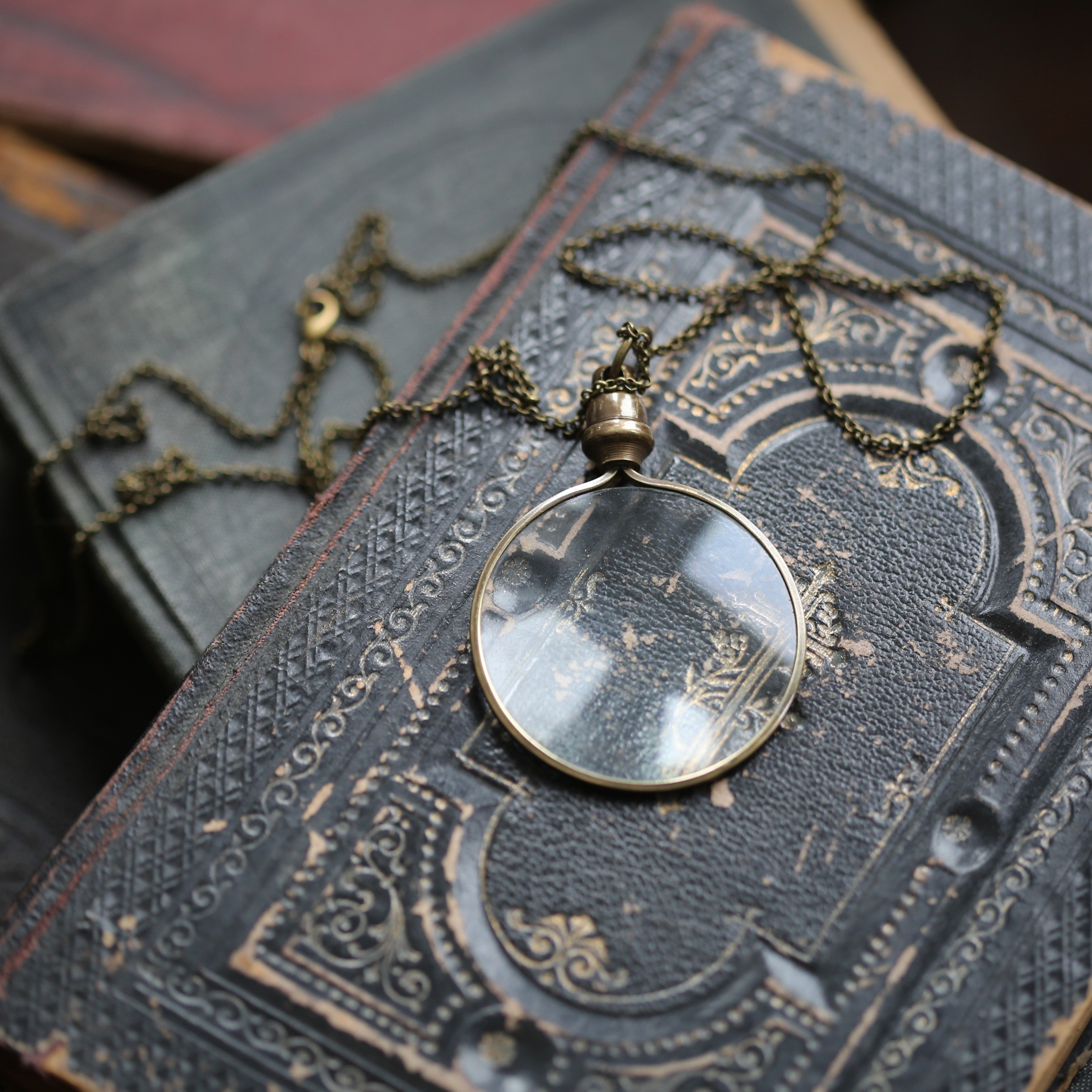 antiqued brass modern vintage inspired long monocle pendant necklace making a thougthful gift