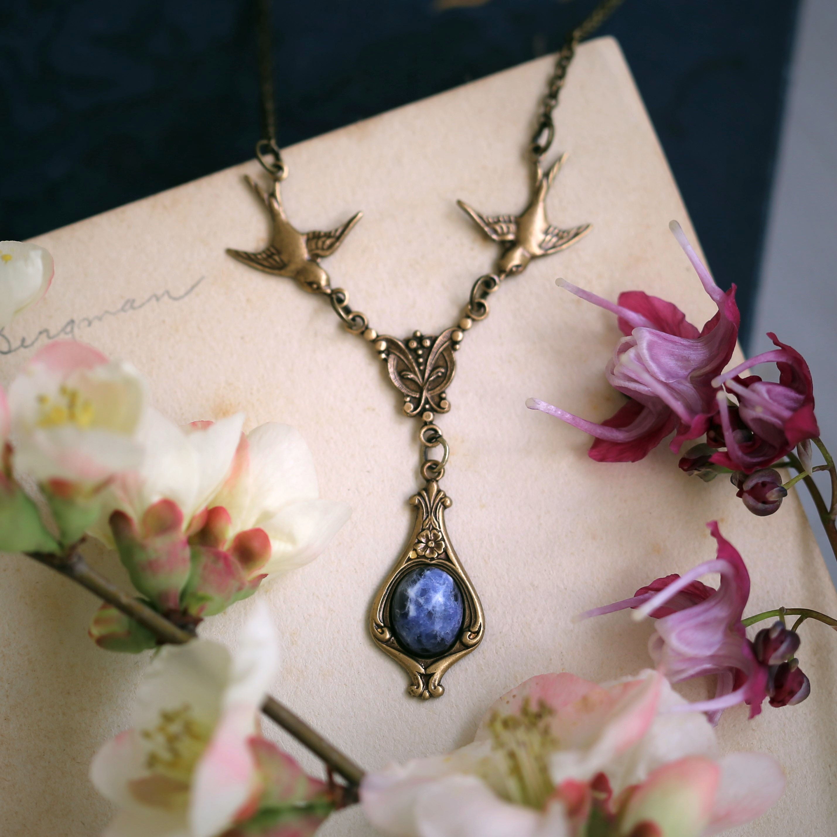 antiqued brass vintage-style blue sodalite stone drop pendant with birds great with a denim jacket