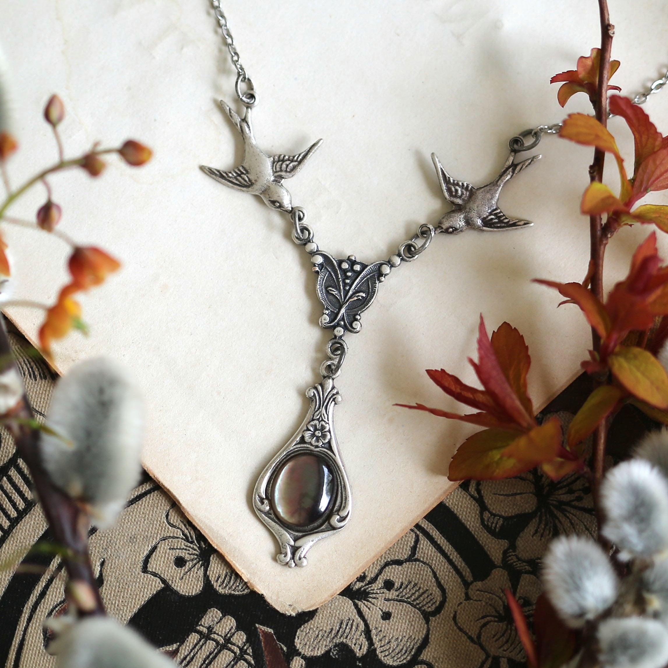 Antiqued silver vintage-style gray shell drop pendant featuring birds in classic academia style gift.