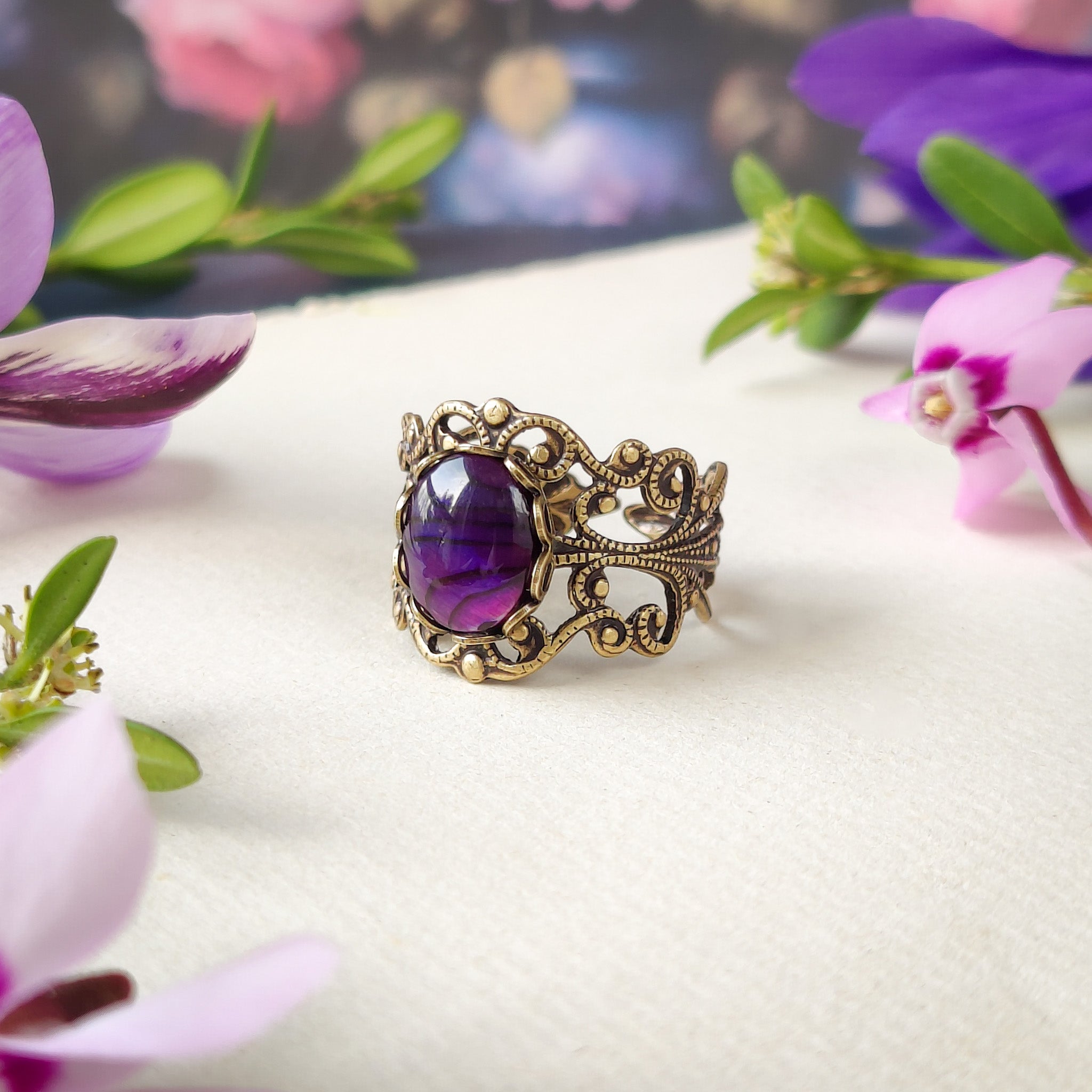 antiqued brass modern vintage inspired fully adjustable brass filigree band ring with an oval purple shell in the lilac femme style for Mother's Day gift