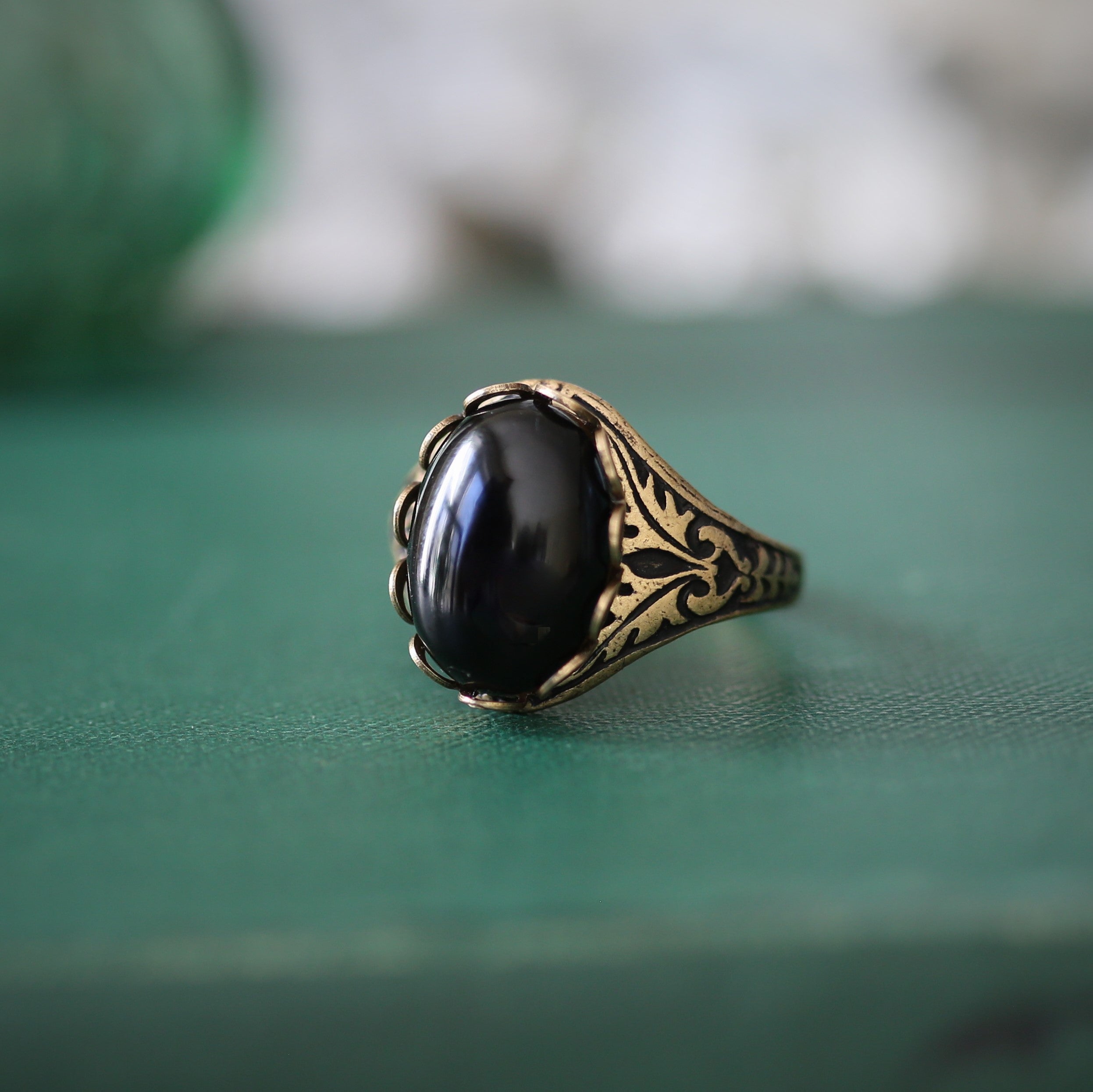 antiqued brass vintage-stye adjustable cocktail ring with black onyx oval stone cabochon in gothic style