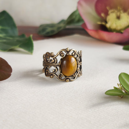 antiqued brass mod vintage inspired adjustable filigree ring with brown oval tiger eye semi-precious stone mineral perfect for a twee outfit.