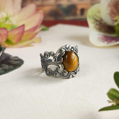 antiqued brass modern vintage inspired adjustable filigree ring with brown oval tiger eye semi-precious stone mineral perfect for a autumn new england outfit.