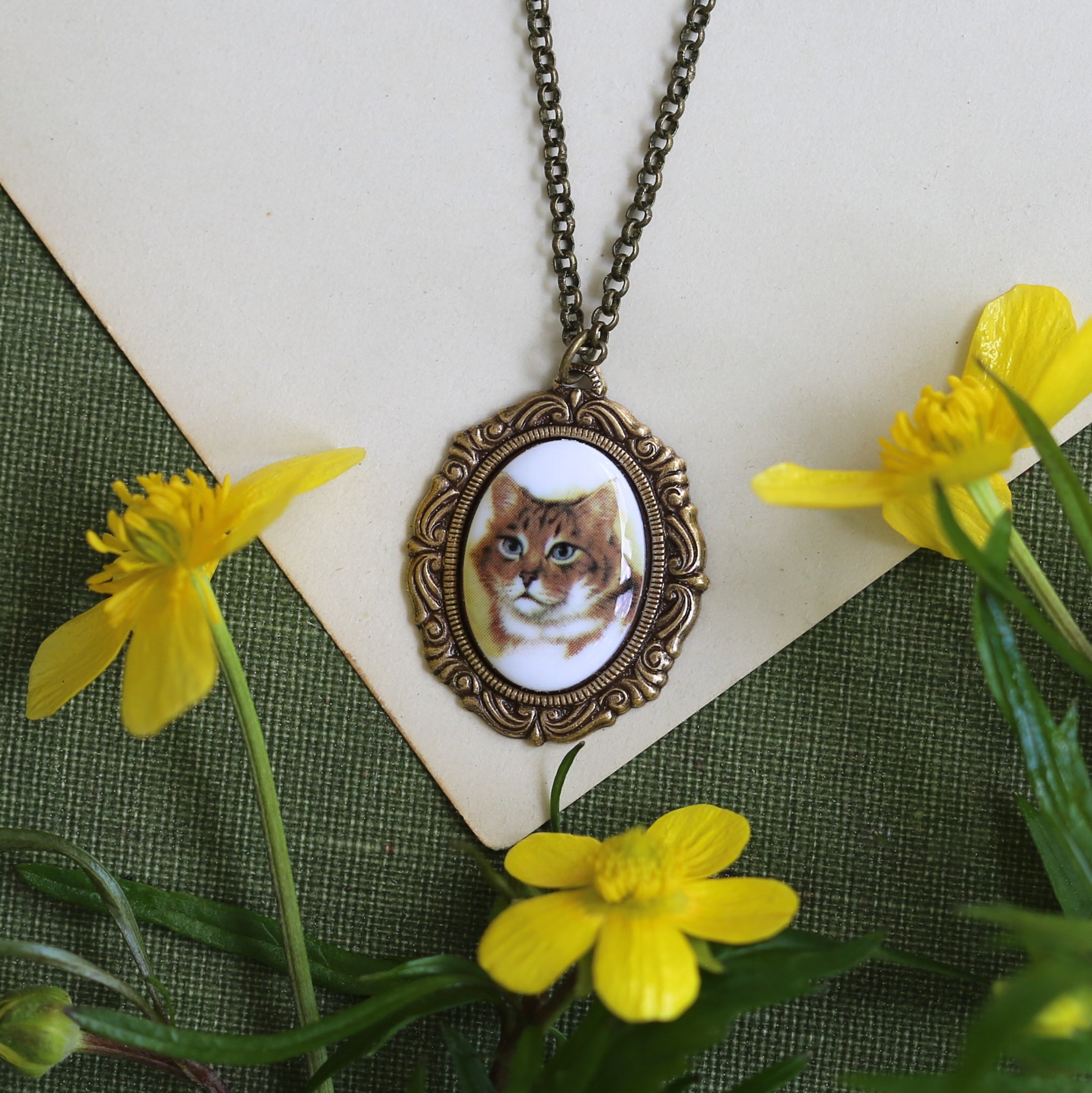 Orange and white tabby cat cameo vintage style antiqued brass necklace by ragtrader vintage.