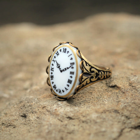 Antiqued brass vintage style clock face cameo on an adjustable brass ring.  Great gift for steampunk