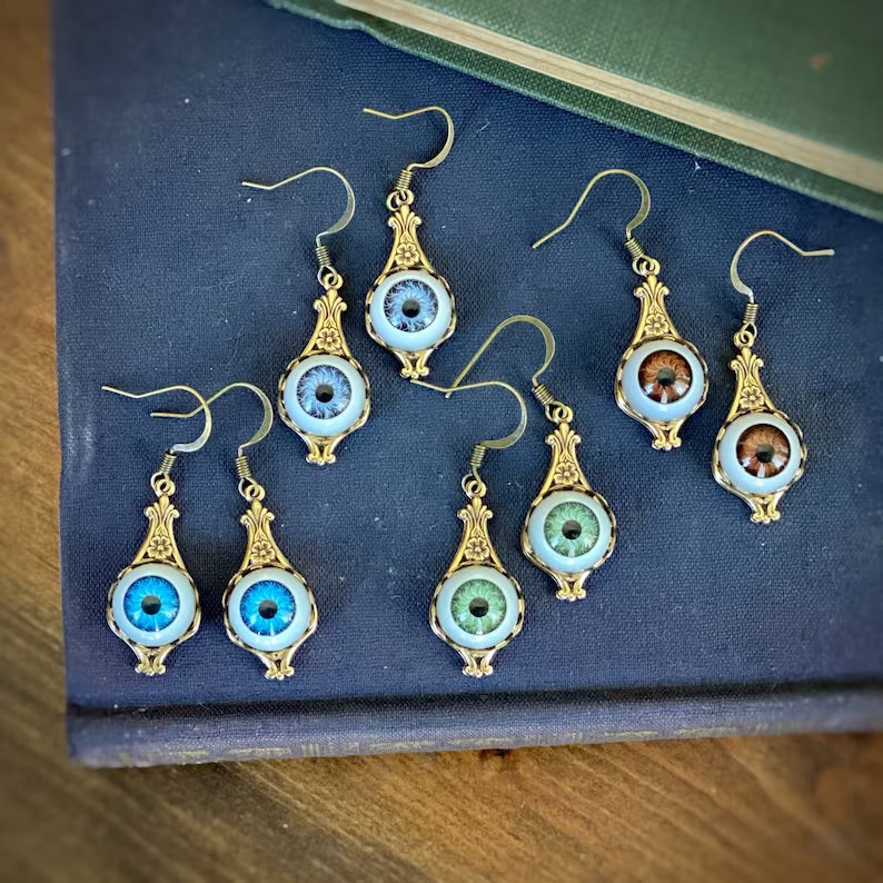 Antiqued brass vintage style blue brown and green evil eye doll's eye dangle drop earrings