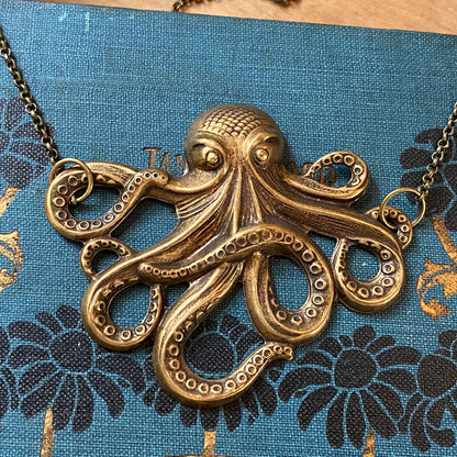 Antiqued brass octopus pendant necklace.
