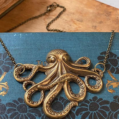 Antiqued brass octopus pendant necklace.